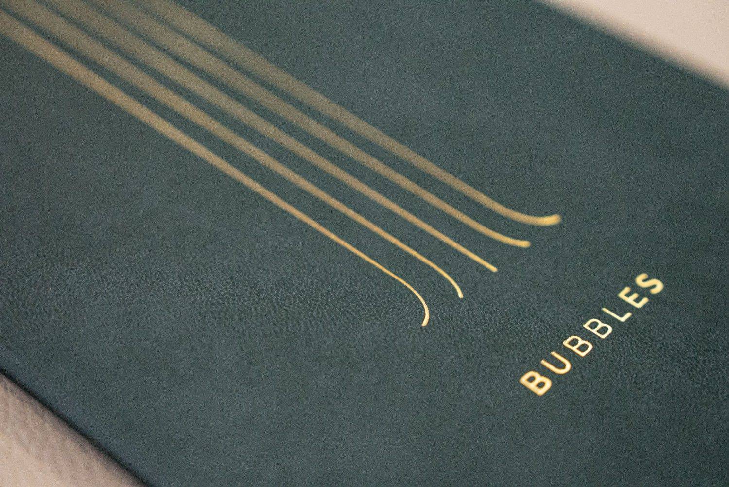 hard cover menu wine bubbles olivar